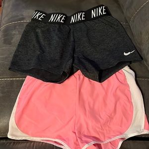 2 pairs of girls athletic shorts, Nike and Xersion